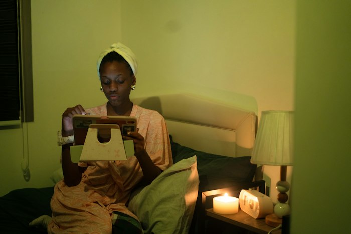 Woman relaxing with hair wrapped in a towel